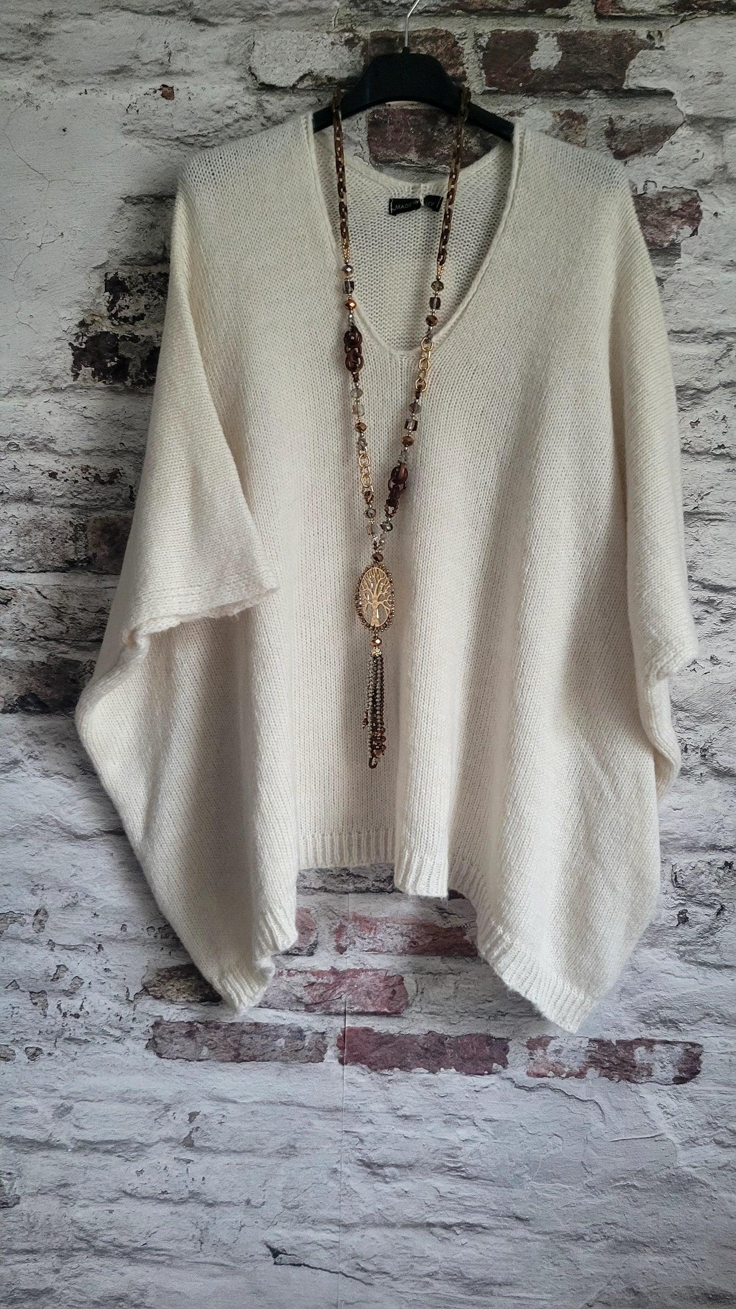 Magnifique pull poncho en maille douce